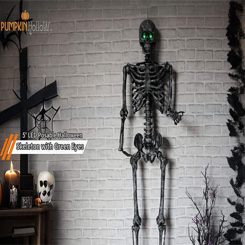 Pumpkin Hollow™ 5' LED Posable Halloween Skeleton with Green Eyes